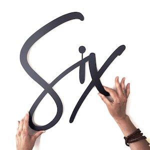 Handwritten steel house number sign