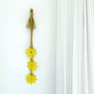 Sage: daisy wall hanging | yellow