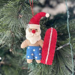 C H R I S T M A S: Surfing santa w blue shorts