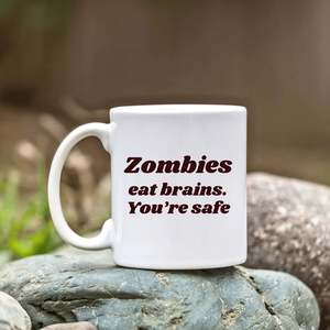 Inappropriate Gifts: Vinyl Decal Sticker: Zombies eat brains. You're safe