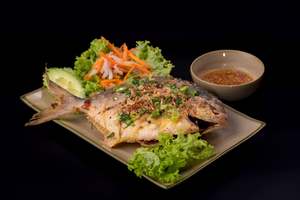 Main Seafood: M25 - CRUNCHY GOLDEN PAMPANO FISH SERVED WITH GARLIC FISH SAUCE