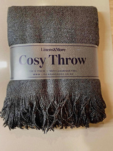 Products: Dark grey cozy throw blanket Love to Give gift hampers Auckland