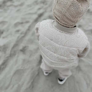 The Wolf Puffer Vest