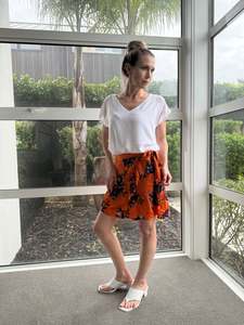 Skirts Shorts: RIVER ISLAND Orange Floral Mini Skirt