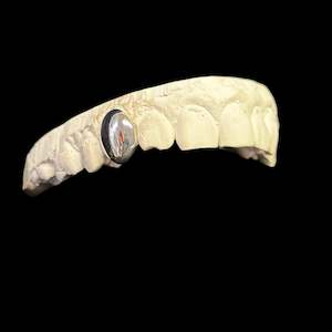 custom made grillz: One tooth in Sterling Silver