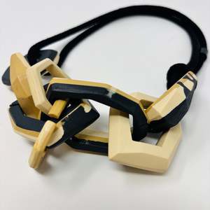Maca Links: Links Necklace, 8 Links on a black cord