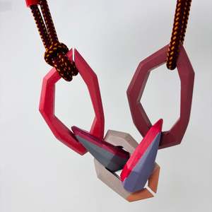 Maca Links: Links Necklace, 5 Links on a burgundy speckled cord