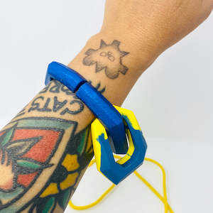 Maca Links: Links Pendant, Yellow and Blue