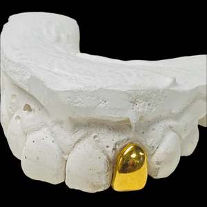 Custom Made Grillz: One tooth in 18kt Gold