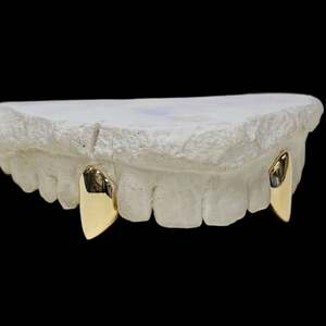 Custom Made Grillz: Two teeth in 9kt Gold