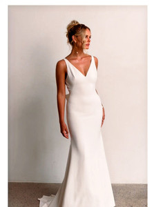 Products: Pippa TC25145 Tania Olsen Discover Pippa sleek and sophiscated modern fit n flare wedding dress with low back - Madison Rose Bridal