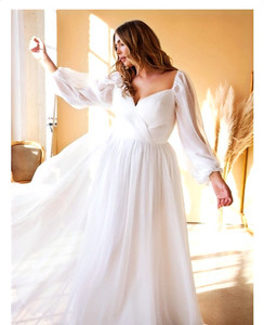 Off Shoulder Chiffon Plus Size Wedding Dress at Madison Rose Bridal