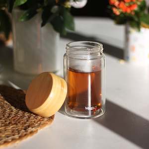 Teaware And Accessories: Double wall Glass Travel Mug