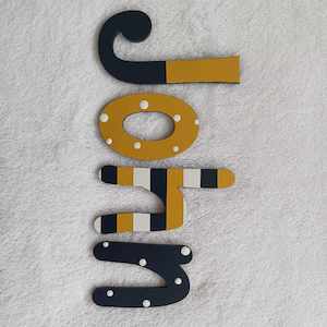 John - small letters suitable for a door.