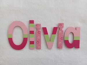 8 Names Suitable For Doors: Olivia - small letters suitable for a door.