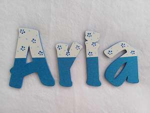 8 Names Suitable For Doors: Aria - small letters suitable for a door.