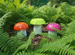 Garden Decor Pick Up Only: Set of 3 multi coloured concrete mushrooms.