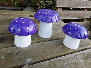 Garden Decor Pick Up Only: Set of 3 purple concrete mushrooms.