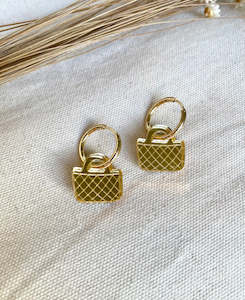 Earrings: Kete Huggie