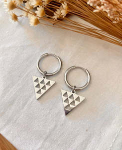 Earrings: Niho Huggies