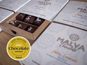 Products: ORDER NOW FOR KIRIHIMETE SOMETHING NEW - Pineapple Slices chocolate enrobed tropical fruit treat that also helps empower Solomon Island women in sustainable agriculture