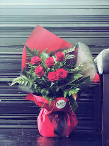 Products: The Rose Vox - Half Dozen (6 Stems Arrangement in Container)