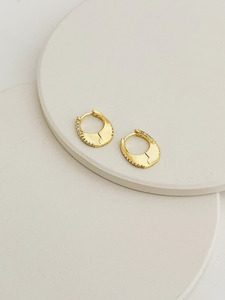 Earrings: Elio Huggies Gold
