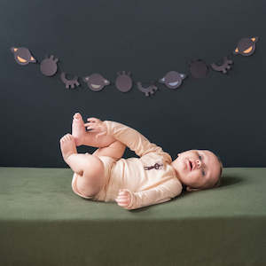 Products: Merino long sleeve bodysuit in soft peach Mello Merino