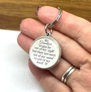 MY GRANDKIDS MIGHT BE OUT OF MY SIGHT KEYRING