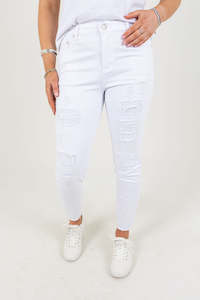 Denim: Pamela White Stretch Jean With Distressing