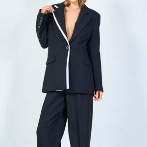 Products: Asymetric black blazer with matching trouser