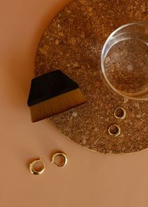 Products: Three Warriors Beauty Buff Tanning Brush