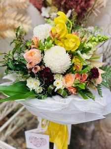 Florals in a water-filled box Moss & Co