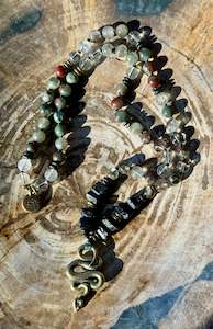 Malas: Mālā, half with Lodalite, Bloodstone and Black Tourmaline Beads with a Snake Pendant