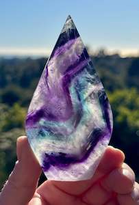Fluorite: Rainbow Fluorite carved Flame 9