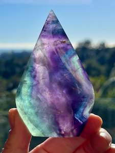 Fluorite: Rainbow Fluorite carved Flame 8