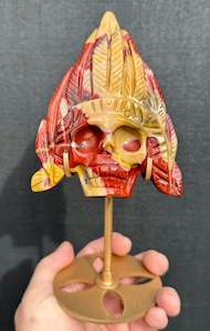 Skulls: Mookaite Jasper carved Skull with Feathers on a stand