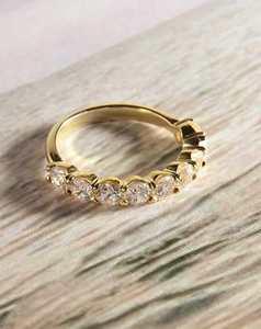 Rings: Young at Heart Claw Set Round Diamond Band