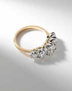 Two Tone Graduated Five Stone Diamond Ring