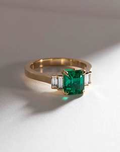 Step Cut Emerald Flanked with Diamond Baguettes