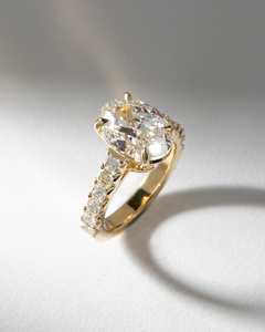 Oval Solitaire with Asscher Cut Diamond Band