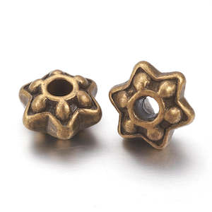 Metal: Metal - Rondelle (Star) - 9mm x 5mm - 20 pieces