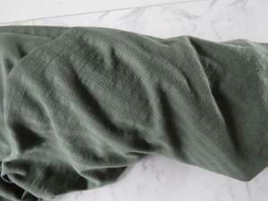 1.6m Huntsmen Olive green textured jersey knit 60% merino 40% polyester 170g