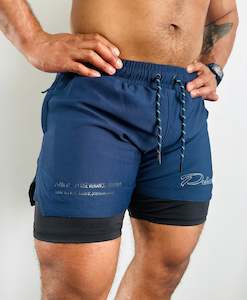 PRIMAL PERFORMANCE 2-IN-1 COMPRESSION SHORTS