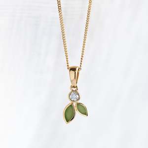 Gold And Greenstone: Pounamu and Diamond Blossom pendant in 9 carat Yellow Gold