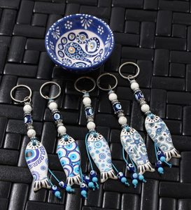 Products: Evil Eye Ceramic Fish Key Ring