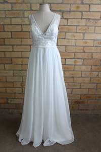 Pre Owned Gowns: Made with Love