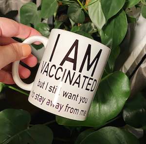 Covid Funnies: I am vaccinated but I still want you to stay away from me mug