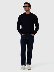 Apparel: Cable-knit crew-neck sweater