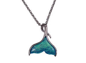 Pendants: Boxed light-blue whale-tail rhodium pendant
